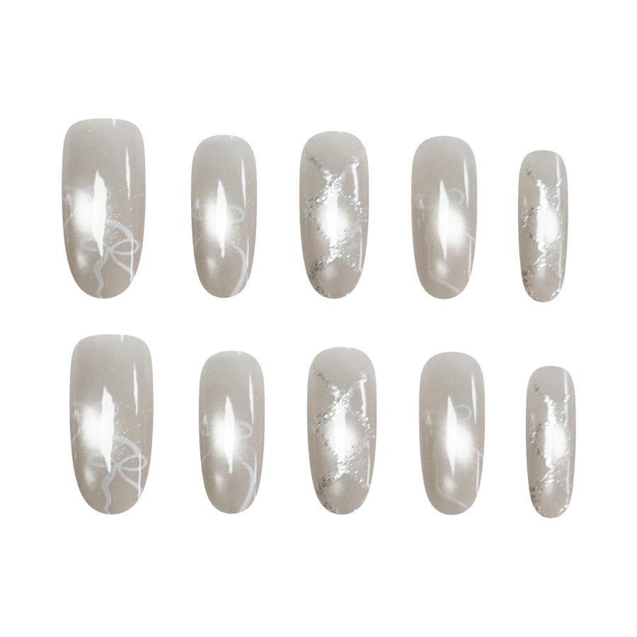 Quilted Bow Cat Eye Nail Art