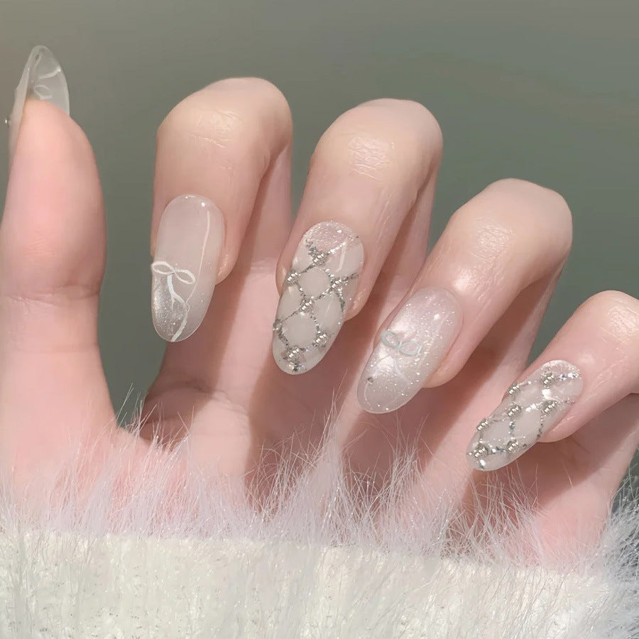 Quilted Bow Cat Eye Nail Art